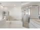 Bathroom with a shower and bathtub at 887 S Gulfview Blvd, Clearwater Beach, FL 33767