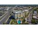 Aerial photograph revealing the condo complex's desirable location near main roads and community pool at 8950 Park Blvd # 406, Seminole, FL 33777