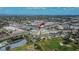 Panoramic aerial shot featuring a condo complex with close proximity to shopping, dining, and golf courses at 8950 Park Blvd # 406, Seminole, FL 33777