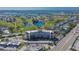 An aerial shot of this beautiful building, located adjacent to a lush golf course and serene water features at 8950 Park Blvd # 406, Seminole, FL 33777