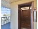 Elevator with an open door, featuring wood paneling at 8950 Park Blvd # 406, Seminole, FL 33777