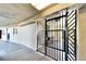 Apartment entryway with a decorative metal gate at 8950 Park Blvd # 406, Seminole, FL 33777