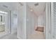 Hallway with view to bathroom and bedroom, with two large closets on the right at 8950 Park Blvd # 406, Seminole, FL 33777