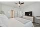 Spacious bedroom with a queen-size bed and ample closet space at 9114 Forge Breeze Loop, Wesley Chapel, FL 33545