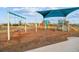 playground with swings and climbing structures at 9114 Forge Breeze Loop, Wesley Chapel, FL 33545