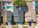 Aerial view of a house with a pool and surrounding houses at 10323 Del Mar Cir, Tampa, FL 33624