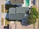 Aerial view of a house with a pool and surrounding houses at 10323 Del Mar Cir, Tampa, FL 33624