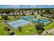 Community tennis courts with surrounding park at 10323 Del Mar Cir, Tampa, FL 33624