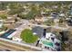 Aerial view of neighborhood with houses and a lake at 10323 Del Mar Cir, Tampa, FL 33624