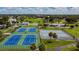 Community park with tennis courts and pathways at 10323 Del Mar Cir, Tampa, FL 33624