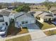 Aerial view of a house and surrounding neighborhood at 10323 Del Mar Cir, Tampa, FL 33624