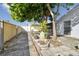 Spacious backyard with a patio and mature trees at 10323 Del Mar Cir, Tampa, FL 33624