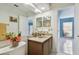 Clean bathroom with shower/tub and wood vanity at 10323 Del Mar Cir, Tampa, FL 33624