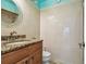 Bathroom with granite vanity, tiled walls, and a shower/tub combo at 10323 Del Mar Cir, Tampa, FL 33624