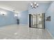 Open dining area with tile floors and a view of the patio at 10323 Del Mar Cir, Tampa, FL 33624