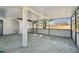 Covered patio with concrete floor and screened enclosure at 10323 Del Mar Cir, Tampa, FL 33624