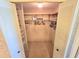 Large walk-in closet with shelving and hanging rods at 12501 Ulmerton Rd # 188, Largo, FL 33774