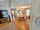 Bright dining area with wood floors and built-in cabinetry at 12501 Ulmerton Rd # 188, Largo, FL 33774
