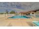 Inviting community pool with plenty of seating at 12501 Ulmerton Rd # 188, Largo, FL 33774