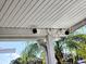 Two security cameras mounted under the patio cover at 12501 Ulmerton Rd # 188, Largo, FL 33774