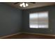 Bedroom featuring neutral walls, tiled floors, and a bright window at 1322 Kenmore St, Port Charlotte, FL 33952