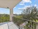 Spacious balcony offering tranquil views of nature at 134 Mariner Dr # 134, Tarpon Springs, FL 34689