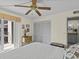 Comfortable bedroom with private balcony access at 134 Mariner Dr # 134, Tarpon Springs, FL 34689