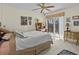 Bright bedroom with balcony access and ceiling fan at 134 Mariner Dr # 134, Tarpon Springs, FL 34689