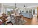 Spacious dining area with large windows and view to living room at 134 Mariner Dr # 134, Tarpon Springs, FL 34689