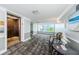 Building hallway with elevator access and seating area at 134 Mariner Dr # 134, Tarpon Springs, FL 34689