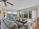 Relaxing living room with large windows and balcony access at 134 Mariner Dr # 134, Tarpon Springs, FL 34689