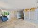 Condo building lobby with seating, mailboxes, and tile floors at 134 Mariner Dr # 134, Tarpon Springs, FL 34689