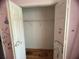Small reach-in closet with wire shelving at 1530 Davenport Dr, New Port Richey, FL 34655