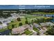 Aerial view of house and nearby schools at 1553 Regal Mist Loop, Trinity, FL 34655