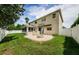Relaxing backyard with patio and grassy area at 1553 Regal Mist Loop, Trinity, FL 34655
