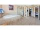 Spa-like bathroom with soaking tub, shower, and walk-in closet at 1553 Regal Mist Loop, Trinity, FL 34655