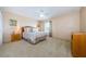 Spacious bedroom with neutral decor and ceiling fan at 1553 Regal Mist Loop, Trinity, FL 34655