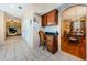 Kitchen features a built-in desk and access to dining and Gathering rooms at 1553 Regal Mist Loop, Trinity, FL 34655