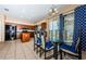 Kitchen features breakfast nook, island, and access to Gathering room at 1553 Regal Mist Loop, Trinity, FL 34655