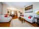 Spacious living room with hardwood floors and comfortable seating at 1553 Regal Mist Loop, Trinity, FL 34655