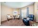 Cozy sitting area with comfortable seating and natural light at 1553 Regal Mist Loop, Trinity, FL 34655