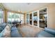 Relaxing sunroom, perfect for indoor-outdoor living at 1553 Regal Mist Loop, Trinity, FL 34655