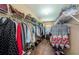 Large walk-in closet with ample shelving and hanging space at 1553 Regal Mist Loop, Trinity, FL 34655
