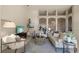 The living room includes neutral colors, recessed lighting, and an open floorplan at 15555 Martinmeadow Dr, Lithia, FL 33547