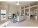 The living room includes neutral colors, recessed lighting, and an open floorplan at 15555 Martinmeadow Dr, Lithia, FL 33547