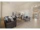 Spacious living room with comfortable seating and decorative accents at 15555 Martinmeadow Dr, Lithia, FL 33547