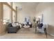 Bright and spacious living room featuring modern decor and an open floor plan at 15555 Martinmeadow Dr, Lithia, FL 33547