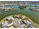 Bird's eye view of home on a waterfront lot in a residential area at 1806 Burlington Cir, Sun City Center, FL 33573