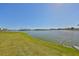 Spacious backyard with a lake view at 1806 Burlington Cir, Sun City Center, FL 33573