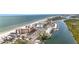 Aerial view of beachfront property with ocean, beach, and waterway at 18304 Gulf Blvd # 619, Redington Shores, FL 33708